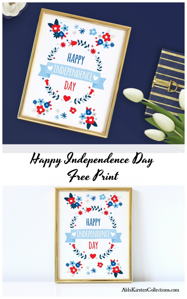 On a dark blue background lies a gold frame with a picture inside that is full of red, white, and blue flowers and the words "Happy Independence Day." White tulips lie in the right corner adorning the free print. Beneath this are the words "Happy Independence Day Free Print," with another framed July 4th picture below them. 