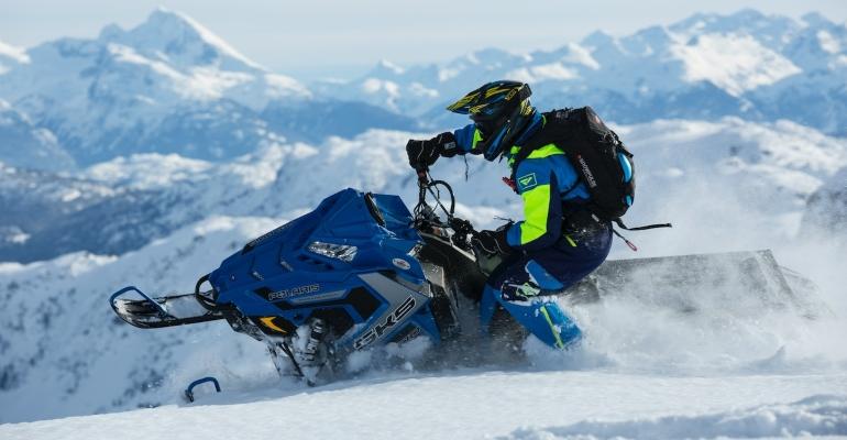 Newcomer's Guide To Michigan's Best Outdoor Activities (3).Jpg -  Man Riding A Snowmobile