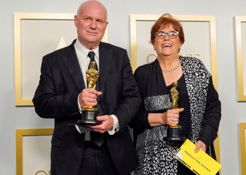 Donald Graham Burt and Jan Pascale pose with their Oscars