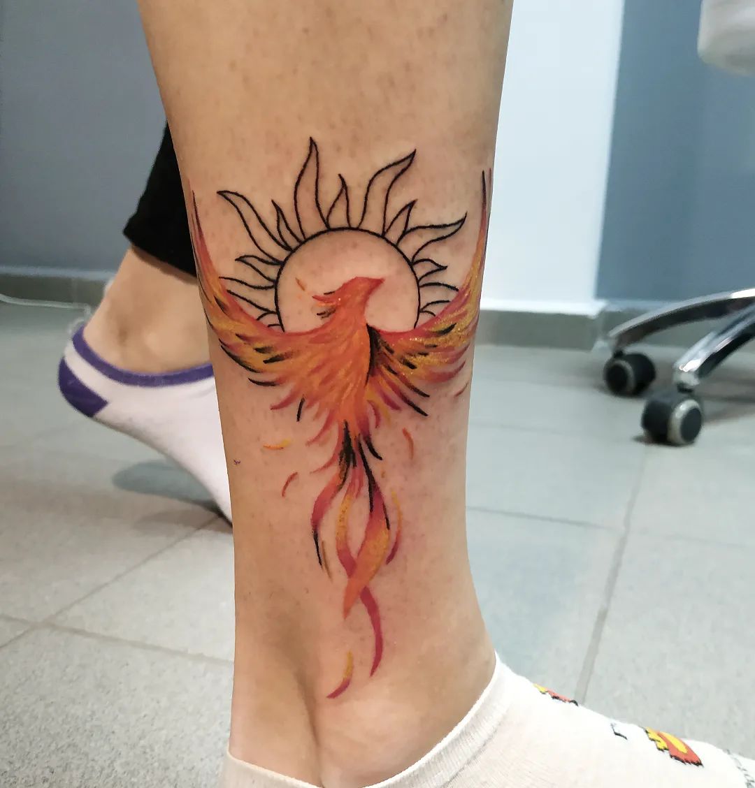 Phoenix And Sun Tattoo