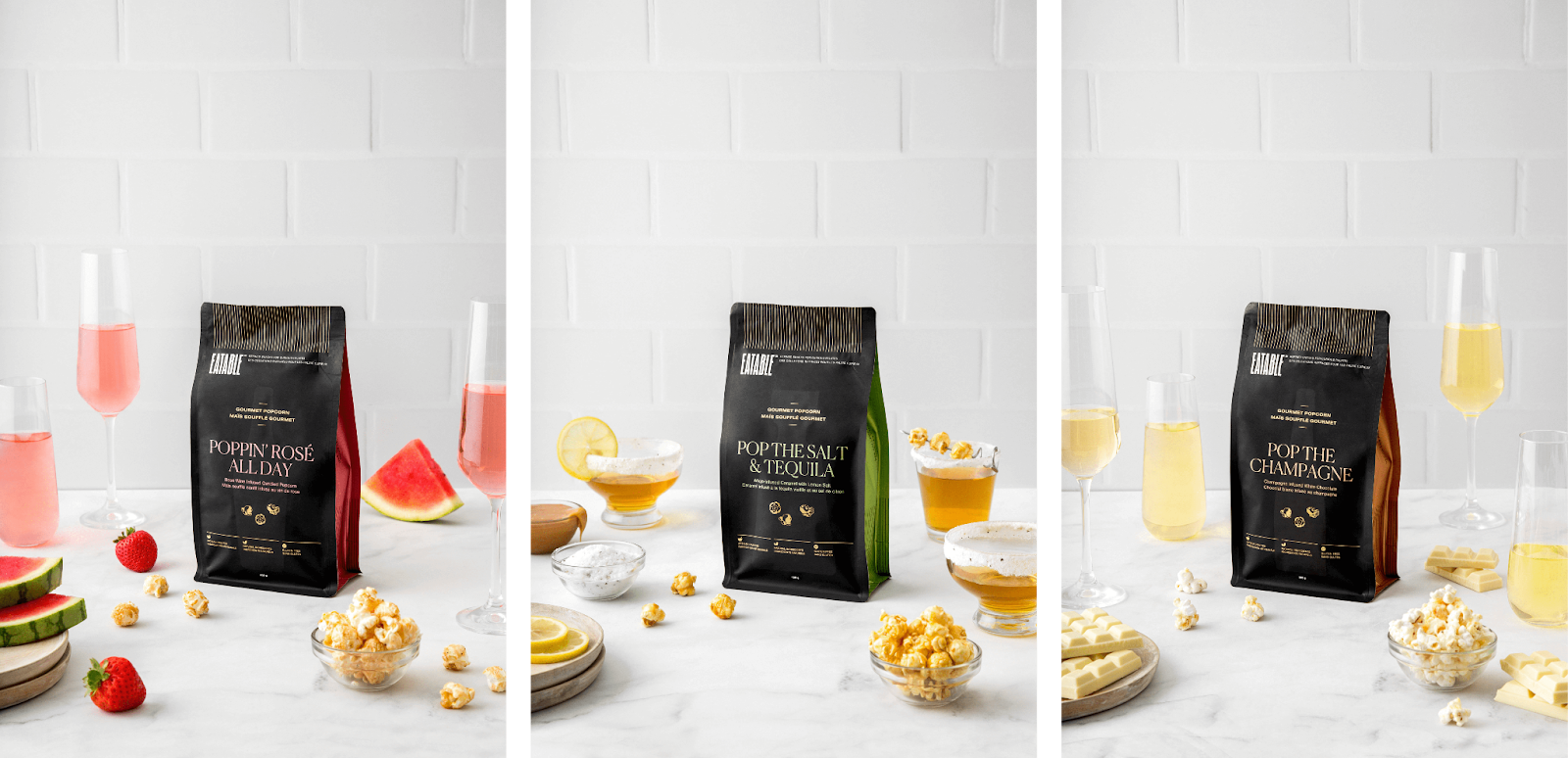 Smile ABCs EATABLE Popcorn–The image shows 3 separate product photos of different flavors. The first is the “Poppin’ Rosé All Day” blend, with champagne glasses of rose beside the bag, along with popcorn kernels, strawberries, and watermelon slices. The second is the “Pop the Salt and Tequila” blend with salt-rimmed glasses of tequila beside the bad, along with kernels, lemon slices, and a bowl of salt. The final is the “Pop The Champagne” blend with glasses of champagne surrounding the bag, along with popcorn kernels, and white chocolate.