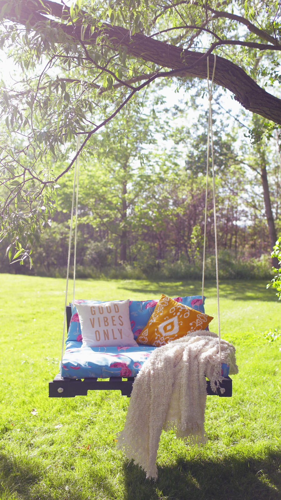 Create a Hanging Swing with Two Pallets: These 12 DIY Outdoor Pallet Furniture Ideas will add some flare to your outdoor space and save you money. 