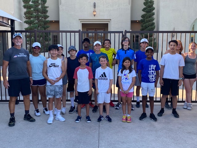 What is the junior tennis program at the Paseo Club?