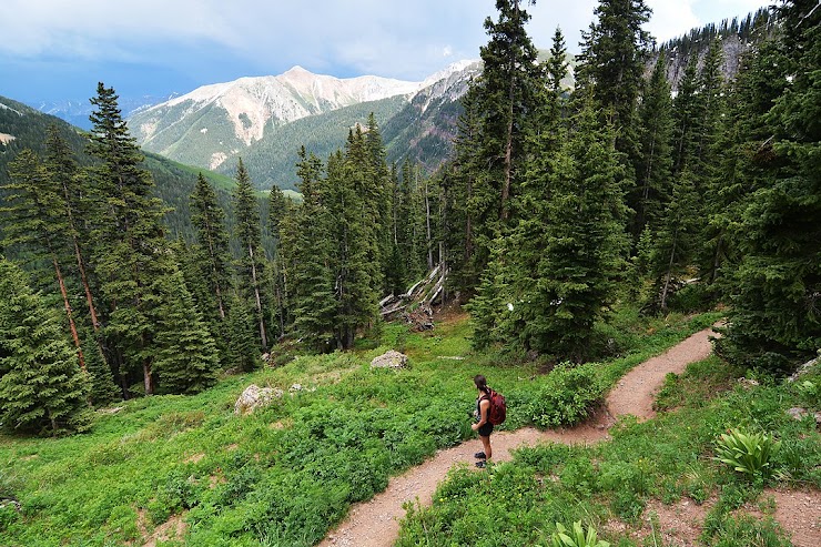 A hiker ascending toward Lower Ice Lake Basin, in Colorado's San Juan National Forest
By Paxson Woelber - Own work, CC BY-SA 4.0, https://commons.wikimedia.org/w/index.php?curid=50096388