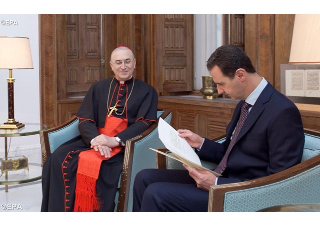 Cardinal Mario Zenari, Apostolic Nuncio to Syria, presents Pope Francis' letter to President Bashar al-Assad - EPA