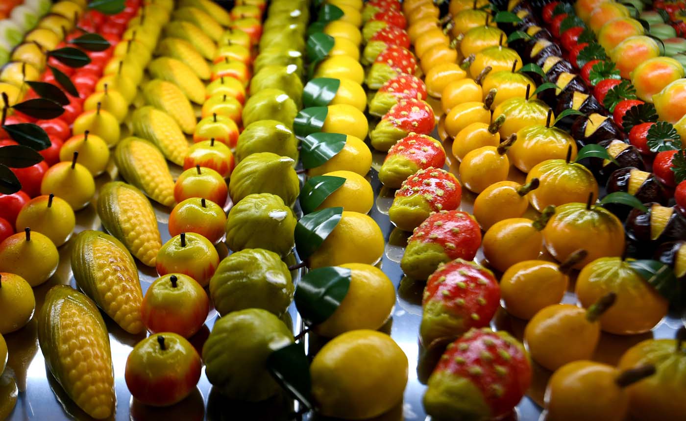 Sweet pastry is on display at a stand during a press tour at FICO Eataly World agri-food park in Bologna on November 9, 2017. FICO Eataly World, said to be the world's biggest agri-food park, will open to the public on November 15, 2017. The free entry park, widely described as the Disney World of Italian food, is ten hectares big and will enshrine all the Italian food biodiversity. / AFP PHOTO / Vincenzo PINTO