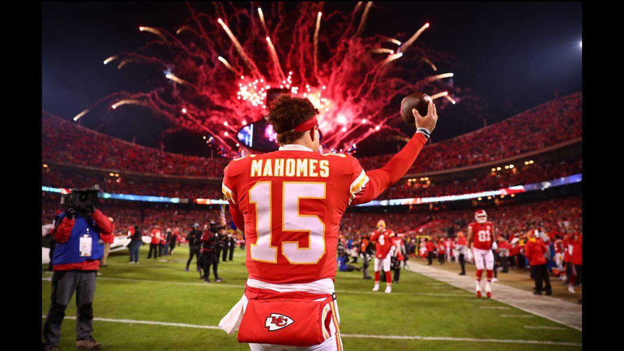 Kansas City Chiefs quarterback Patrick Mahomes (15) warming up with fireworks in the sky prior to the wildcard playoff football game against the Pittsburgh Steelers, Sunday, January 16, 2022 in Kansas City.