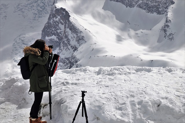 a girl taking nature photography. things to do while camping for adults