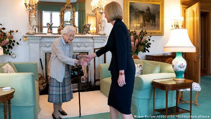 Queen Elizabeth II (left) shakes the hand of Liz Truss during an audience at her residence in Balmoral, Scotland. September 6, 2022. 