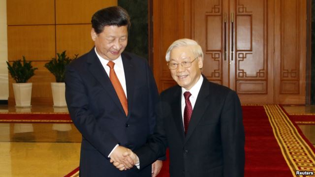 Chủ tịch Trung Quốc Tập Cận Bình và Tổng Bí thư đảng Cộng sản Việt Nam Nguyễn Phú Trọng tại Hà Nội, ngày 5 Tháng 11, 2015.