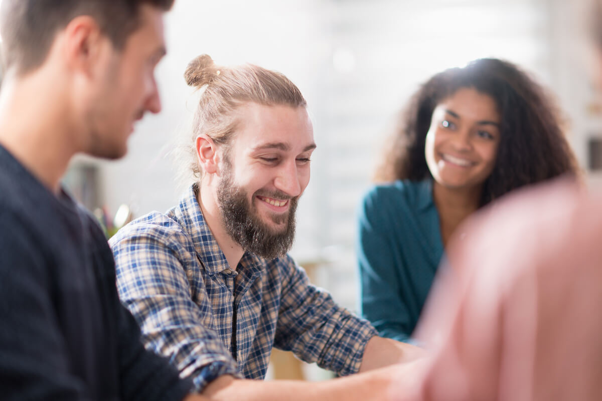 Mental health outcomes: group of people talking to each other