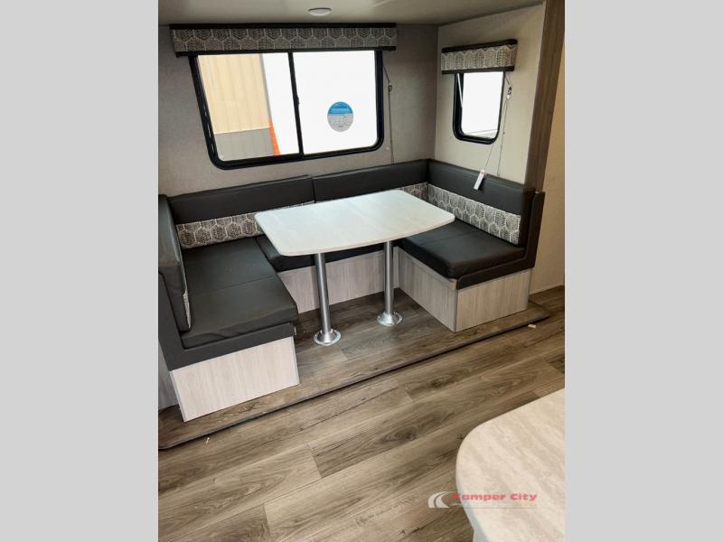 Dinette inside the Coachman Catalina Summit series 8 channel trailer