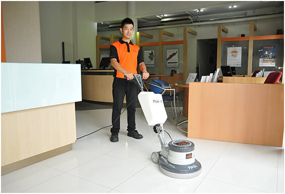 A staff of a Singapore office cleaning company