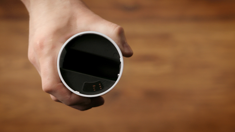 Gently untwist the cap of Outdoor Camera to access battery.