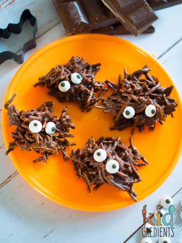 Chocolate swamp monsters displayed on an orange plate.