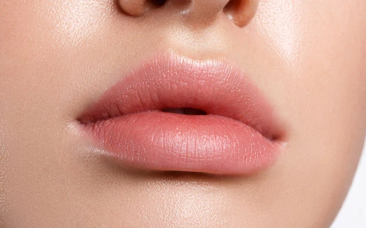 Tinted lip balm will give you slightly pink lips.