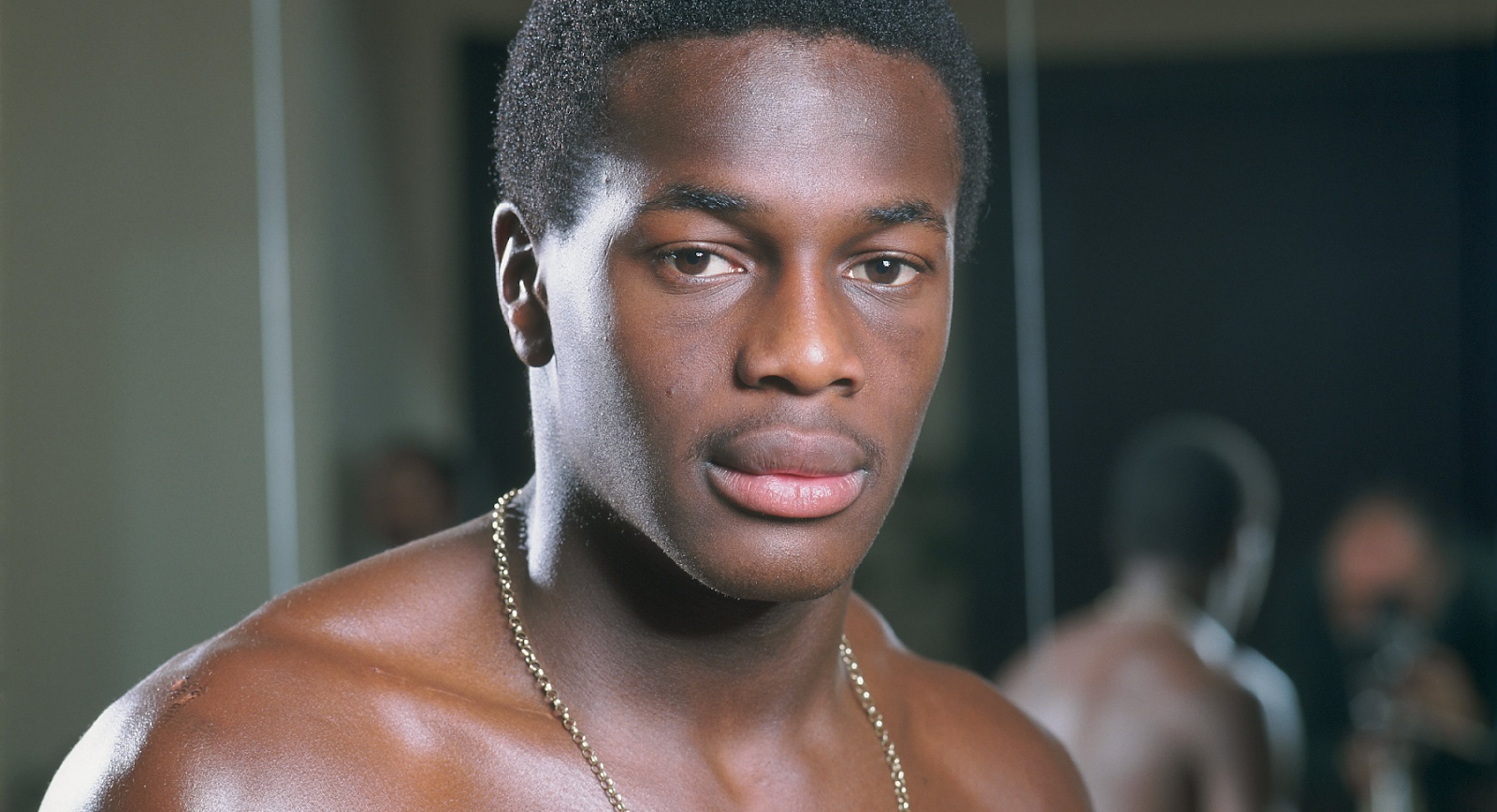 Fashanu posing for a magazine