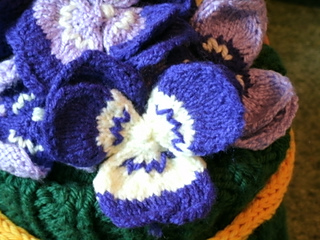 knitted pansies in container