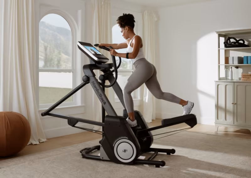 Woman Exercising on the Most Unique Elliptical: The NordicTrack FreeStride Trainer