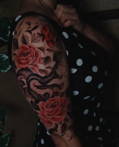 Beautiful Flower With Snake Tattoo On Shoulder
