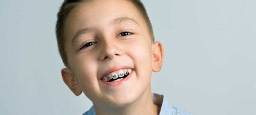 Boy Smiling with braces