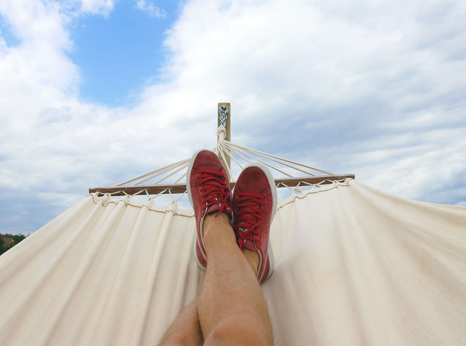 A person's feet in a hammock