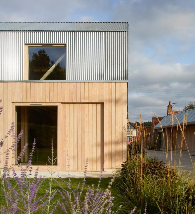 Modern Farmhouse with Wooden Facade