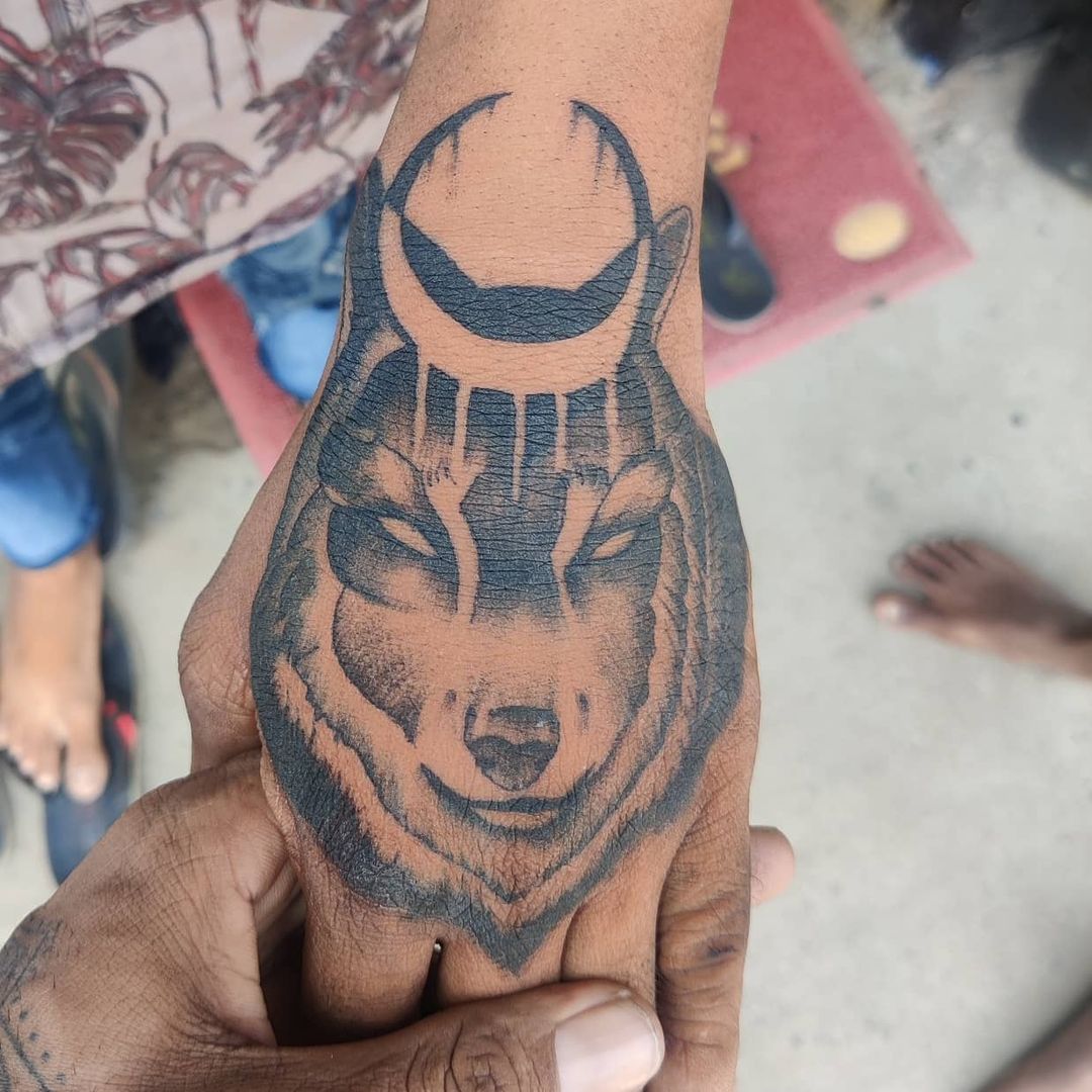 Unique Wolf And Moon Tattoo On hand