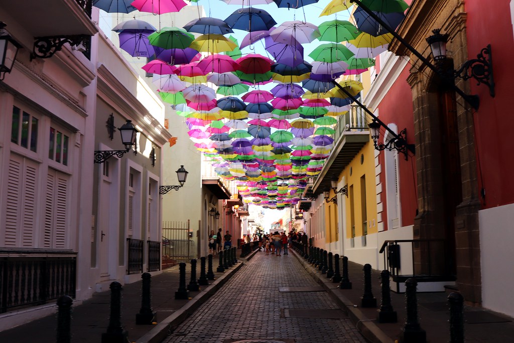 Multi Coloured Umbrella corridor in a street of colourful buildings in San Juan Puerto Rico