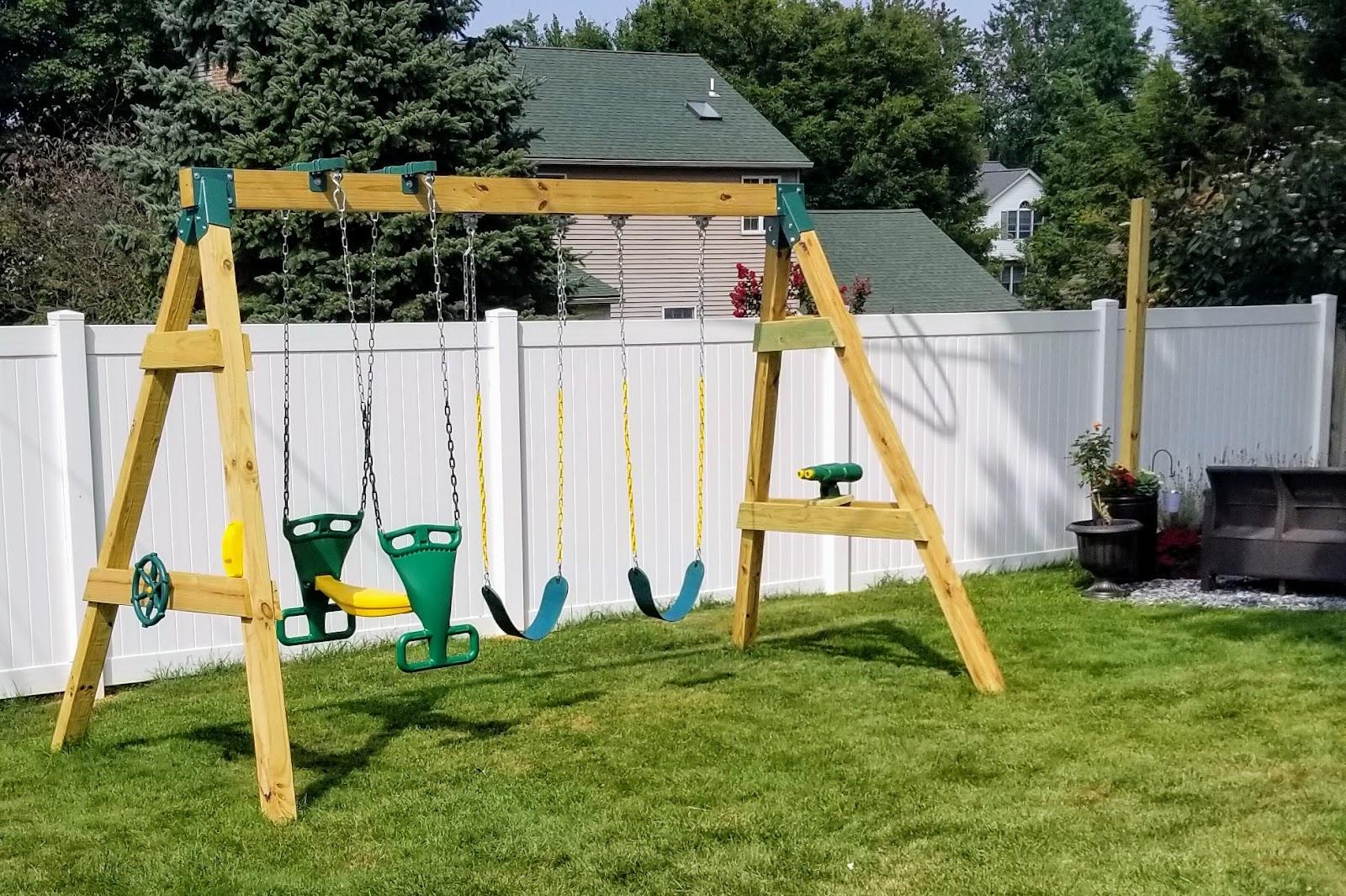 Avoid the high price tag of pre-assembled swing sets, and learn how to build a backyard swing set for cheap with this idea for kids!