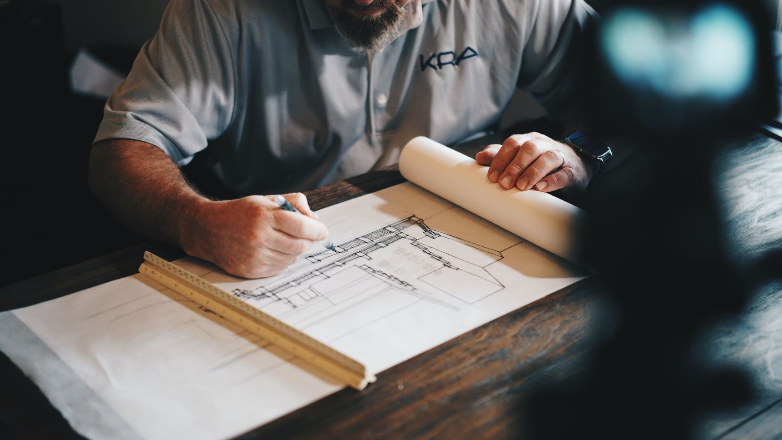 An architect working on building plans