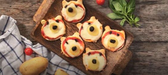 picture of mini-pizza in the shape of teddy bears 