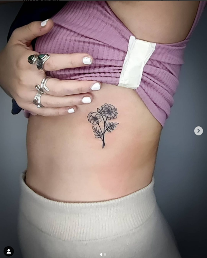 Flower Themed Rib Tattoos 29