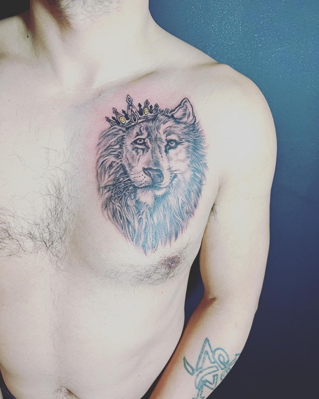 Half Wolf Half Lion Tattoo
