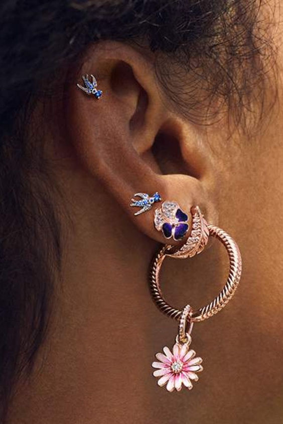 Side view of the iconic earrings with style