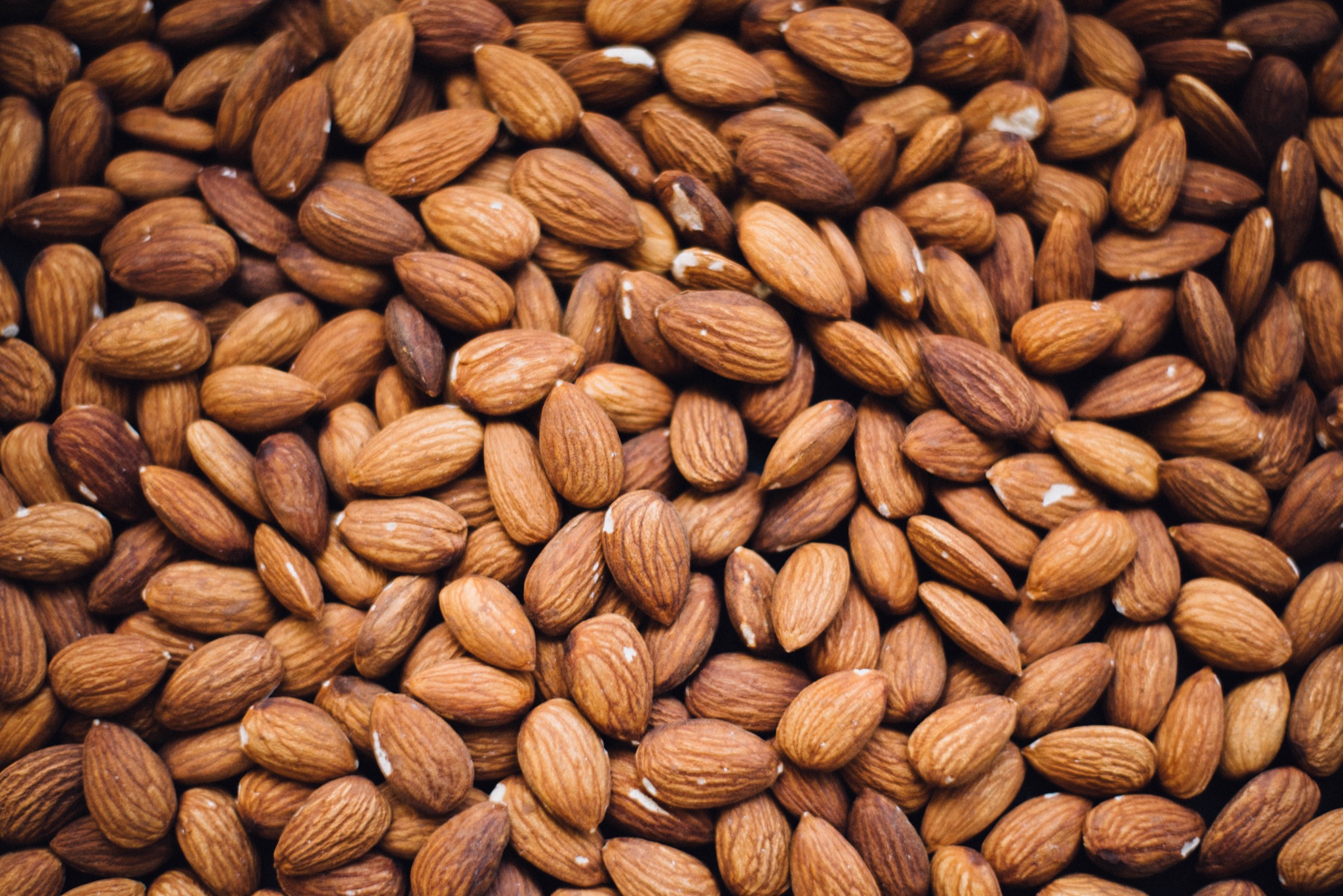 Healthy Mom Blogger 2022 Family Influencer discusses healthy foods for mental health - this is an almond