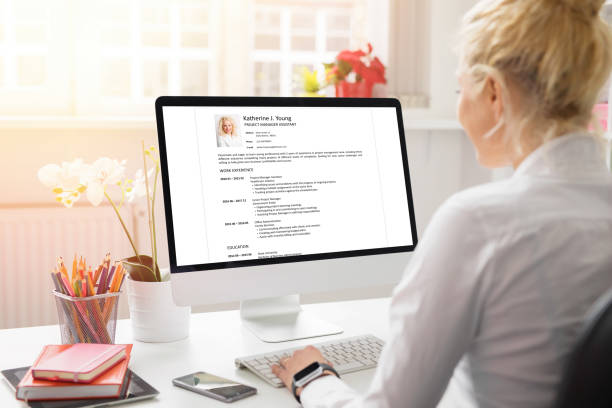 Woman creating her CV on computer