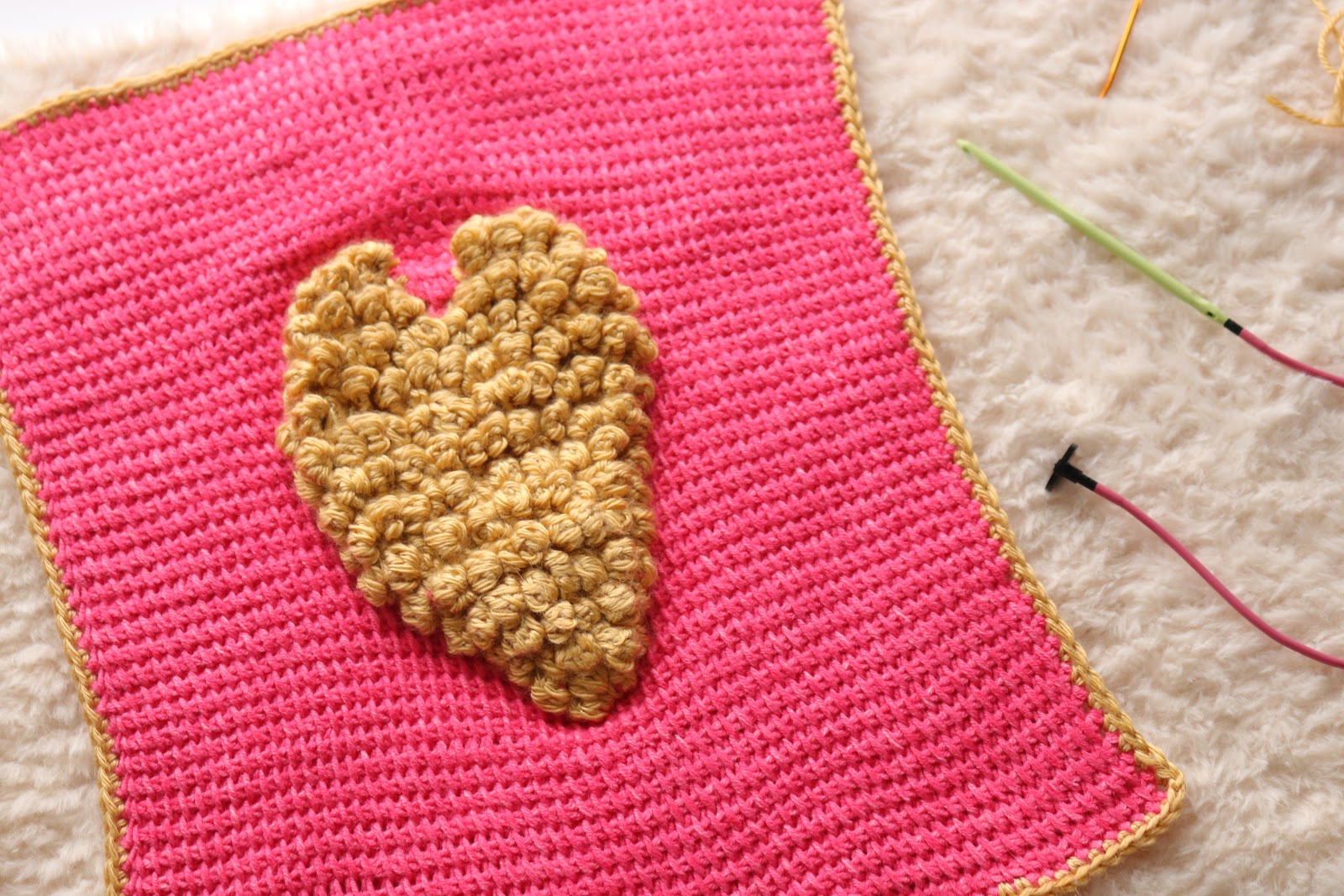 Need free bobble stitch crochet patterns? You are in the right place. Check out this fun Tunisian crochet bobble stitch heart square pattern!