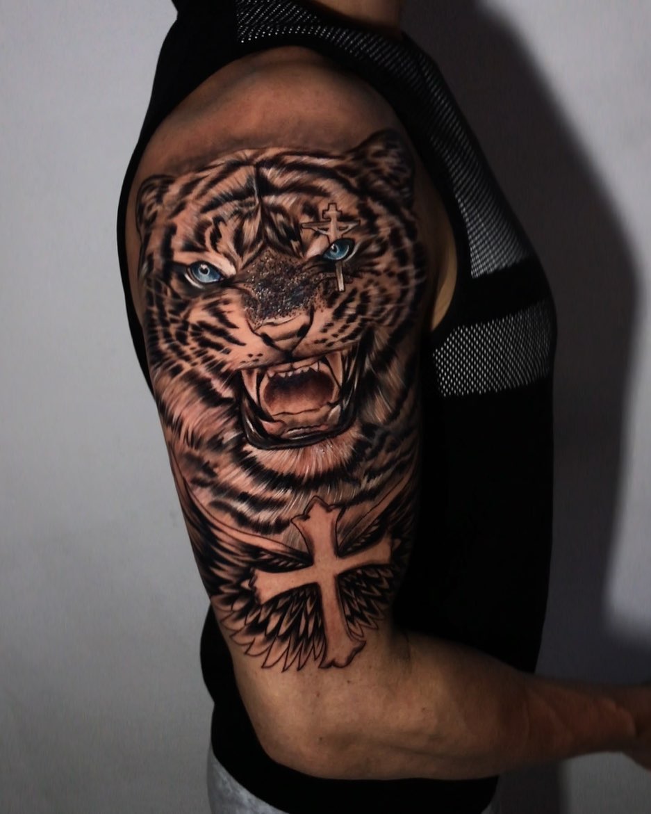 Scary Tiger With Cross Tattoo