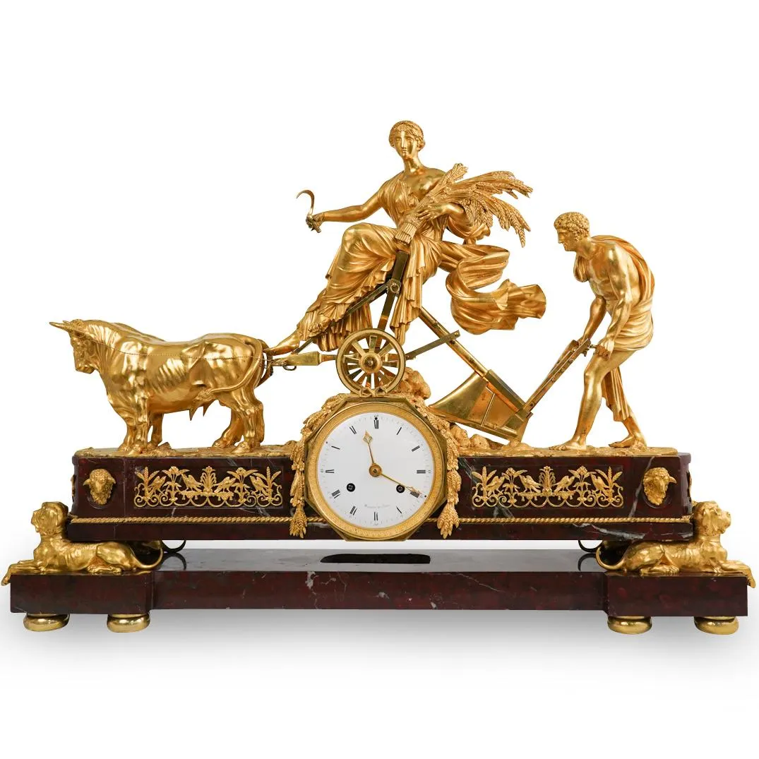 Rare 19th-century gilt bronze and red griotte marble mantle clock