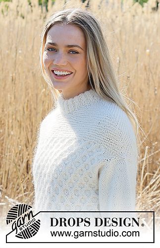 woman wearing a cable knit pullover