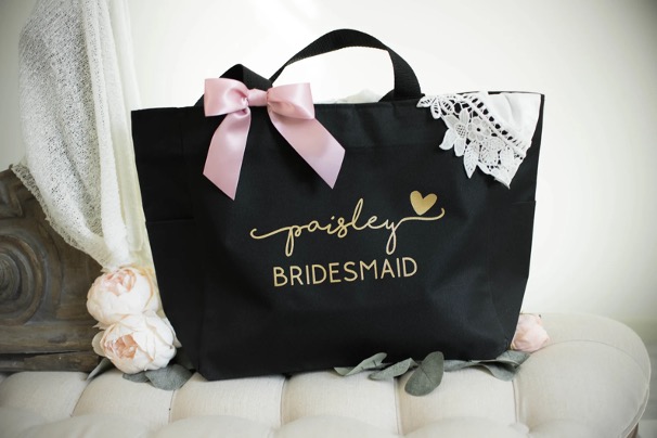black tote bag with name and wedding party title in gold font