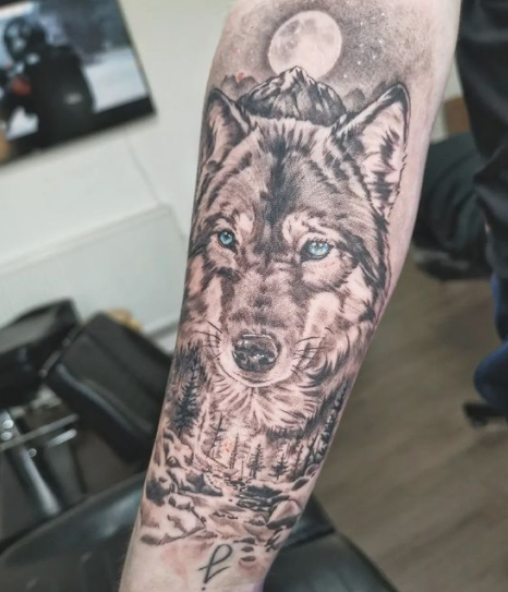 Wolf Moon Tattoo On Forearm