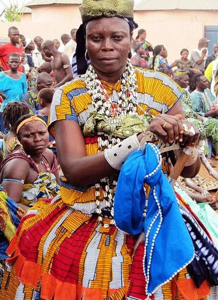 Woman in African dress celebrating Oya
