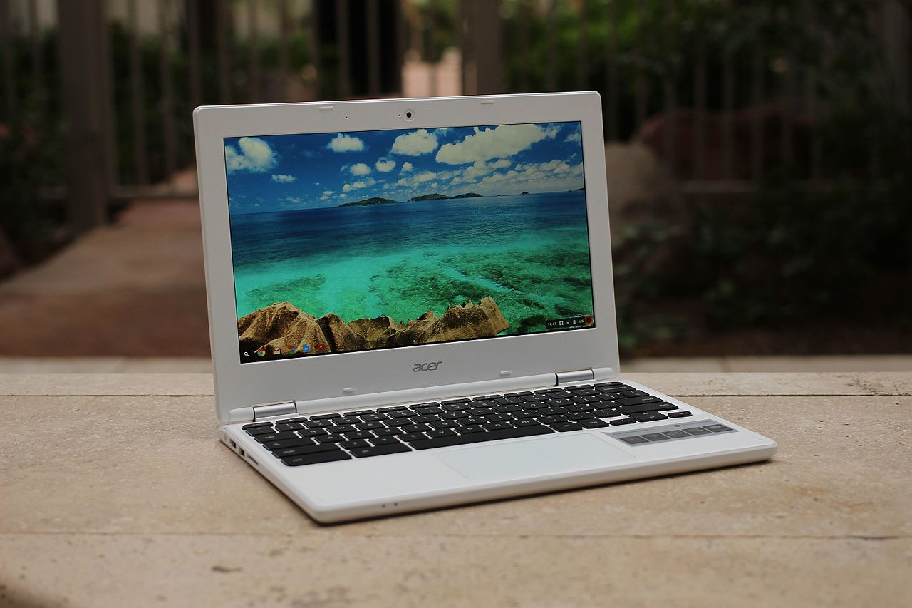 This image shows the Acer Chromebook in white color in the table.