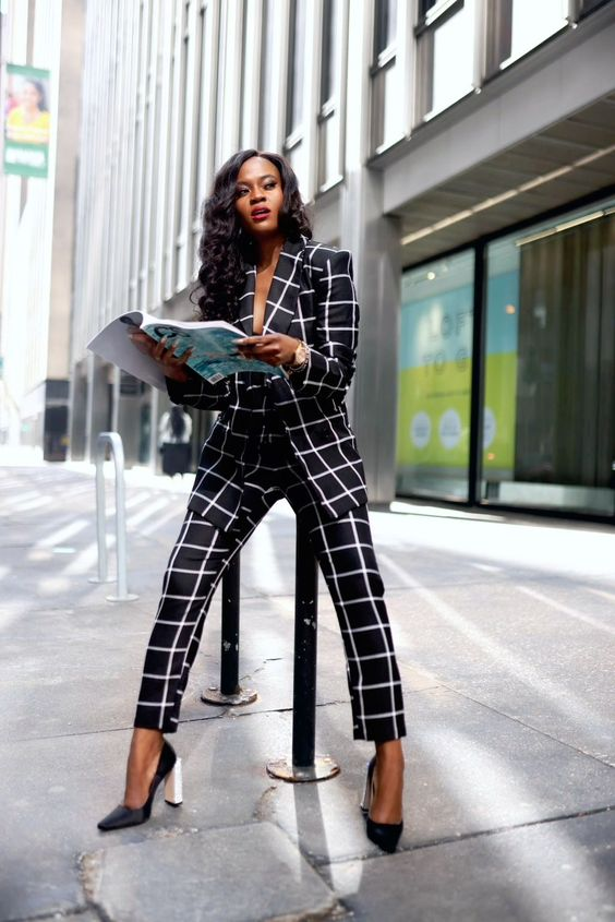 Model wearing a check suit. 