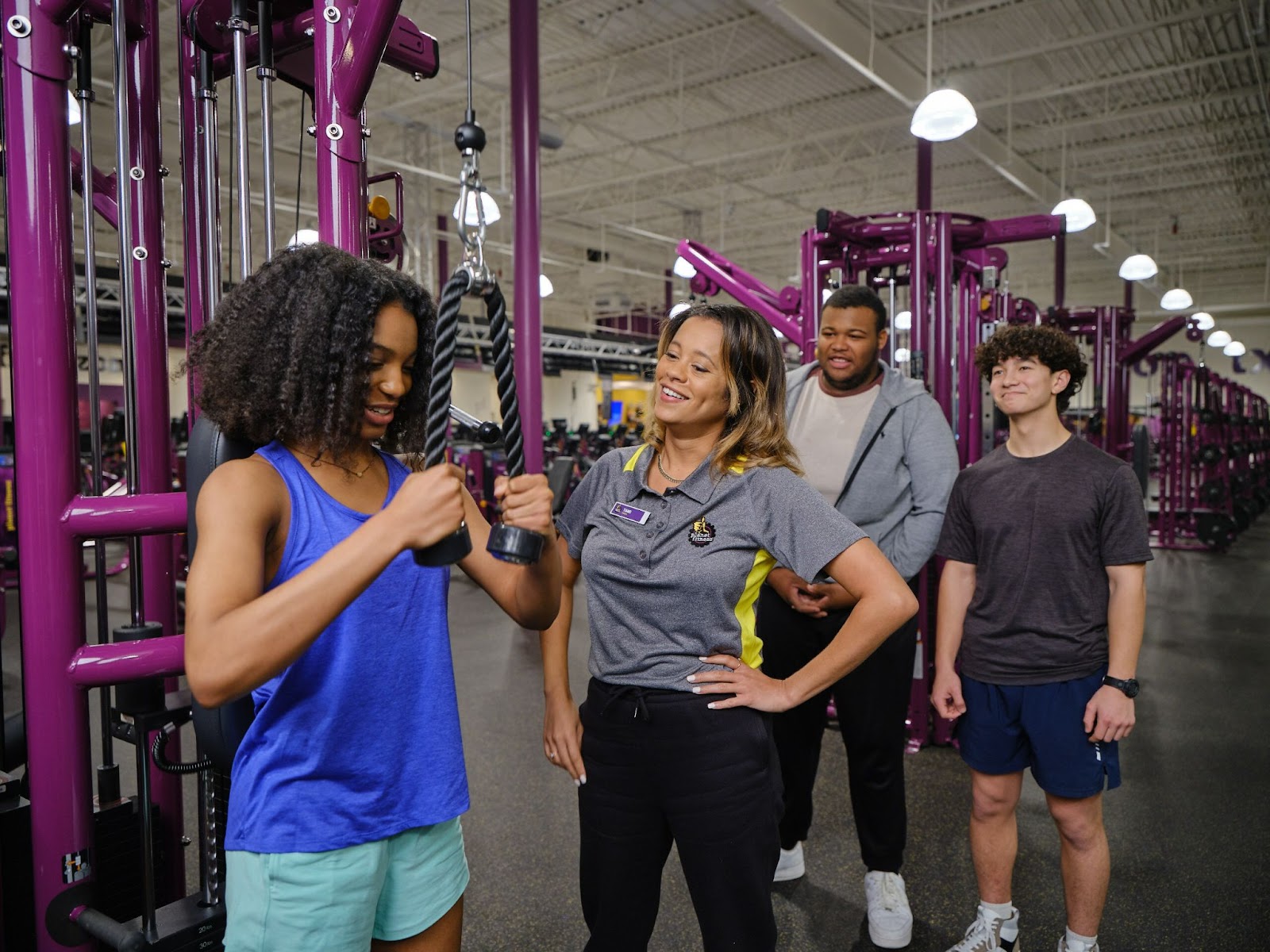 Students workout at Planet Fitness.
