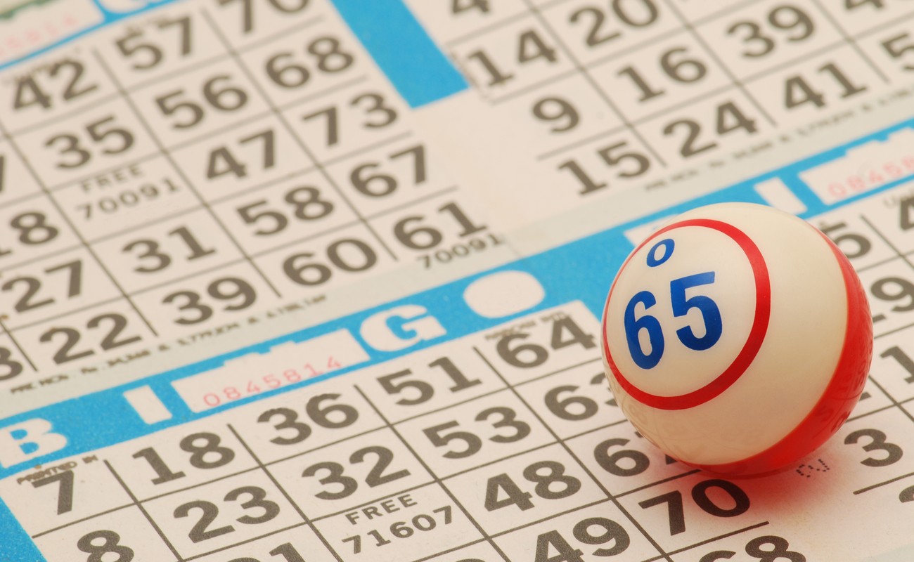 Bingo ball on bingo number card