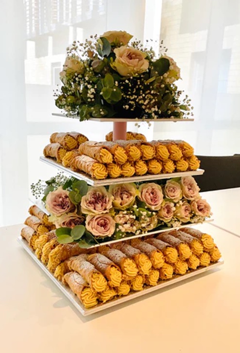 cannoli tower wedding cake display