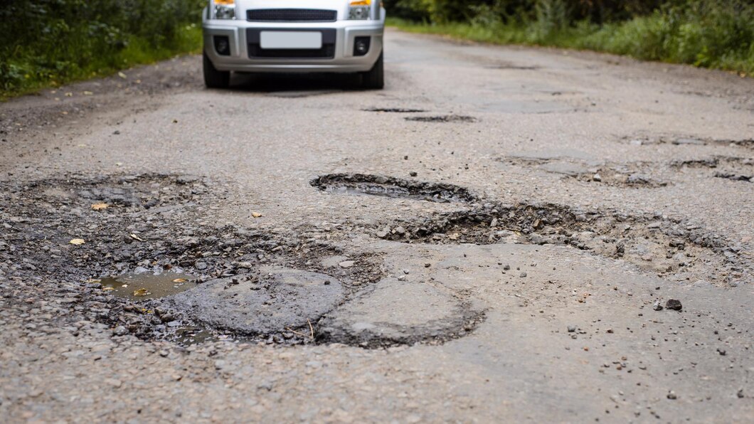 Avoid Driving On Bad Roads With A Rough Surface And Potholes
